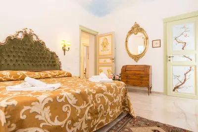 Letto o letti in una camera di Ca' Venezia Loc-09522