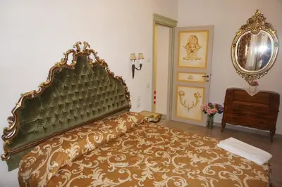 Letto o letti in una camera di Ca' Venezia Loc-09522