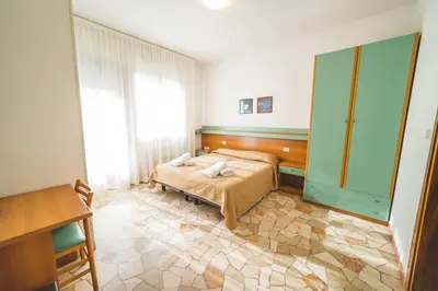 Letto o letti in una camera di Hotel Grand Prix