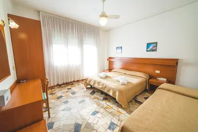 Letto o letti in una camera di Hotel Grand Prix