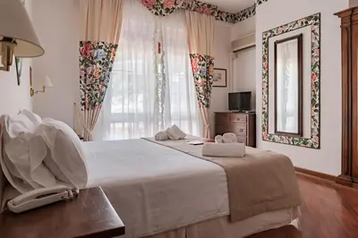 Letto o letti in una camera di Agora Park Hotel
