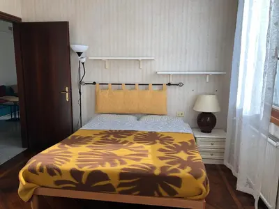 Letto o letti in una camera di Casa Vacanze Lido Di Venezia