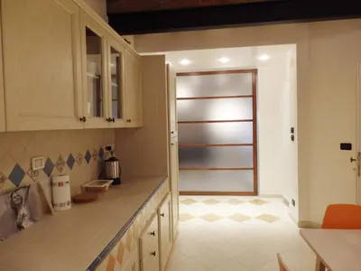 Cucina o angolo cottura di appartamento alla Crea