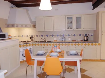 Cucina o angolo cottura di appartamento alla Crea