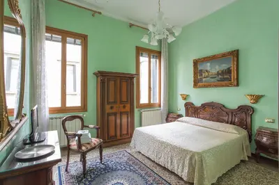 Letto o letti in una camera di BB Venezia