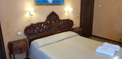 Letto o letti in una camera di BB Venezia