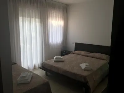 Letto o letti in una camera di Villa Gentile