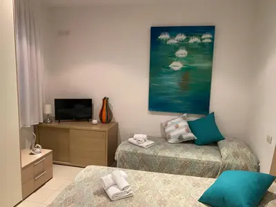 Letto o letti in una camera di Villa Gentile