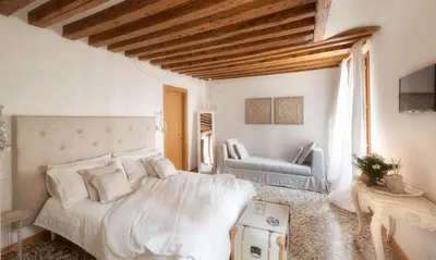Letto o letti in una camera di Laguna724