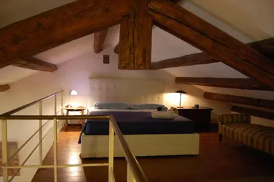 Letto o letti in una camera di Loft Ca'Drasi