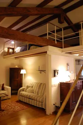Letto o letti in una camera di Loft Ca'Drasi