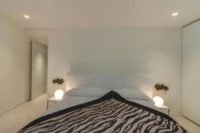 Letto o letti in una camera di VeNICe Cera Casa Del Giglio