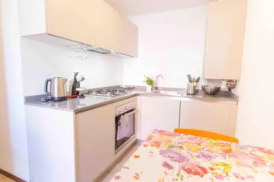Cucina o angolo cottura di CA CAMMELLO private terrace and canal view