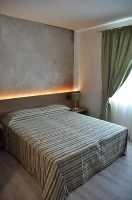Letto o letti in una camera di Casa Rosanna