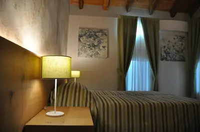 Letto o letti in una camera di Casa Rosanna
