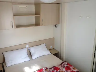Letto o letti in una camera di Oliholiday Mobilehomes - Cavallino