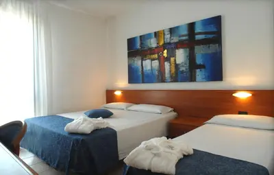 Letto o letti in una camera di Hotel Scaldaferro