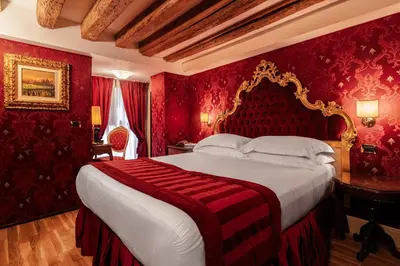 Letto o letti in una camera di Palazzo Paruta & Wellness Suites