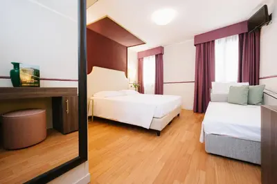 Letto o letti in una camera di Hotel Do Pozzi