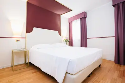 Letto o letti in una camera di Hotel Do Pozzi