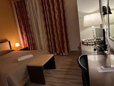 Letto o letti in una camera di Hotel Le Calandre