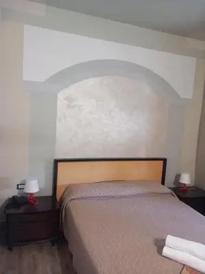 Letto o letti in una camera di Hotel Le Calandre