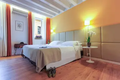 Letto o letti in una camera di Relais Santa Corona