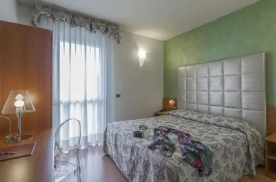 Letto o letti in una camera di Hotel Doge
