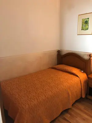 Letto o letti in una camera di Hotel Victoria