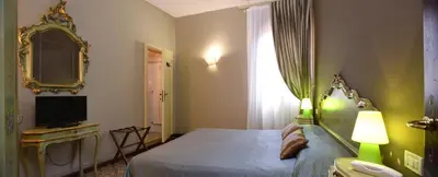 Letto o letti in una camera di Locanda Casa Martini