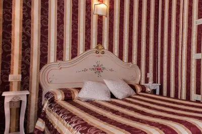 Letto o letti in una camera di Locanda Casa Martini