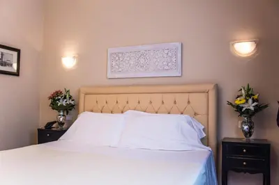 Letto o letti in una camera di Hotel Patavium