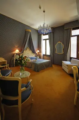 Letto o letti in una camera di Hotel Torino