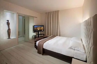 Letto o letti in una camera di Base Hotel