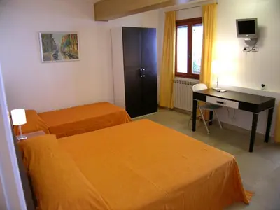 Letto o letti in una camera di B&B Casa in Laguna