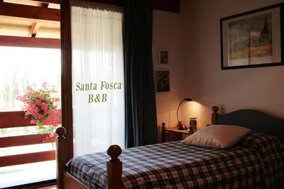Letto o letti in una camera di B&B Santa Fosca