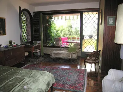 Letto o letti in una camera di Villa Tra' Monti