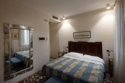 Letto o letti in una camera di CityHotel Cristina Vicenza