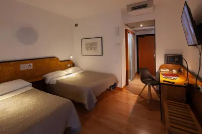 Letto o letti in una camera di CityHotel Cristina Vicenza