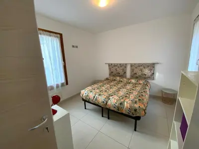 Letto o letti in una camera di Palazzo Penzo Bellemo