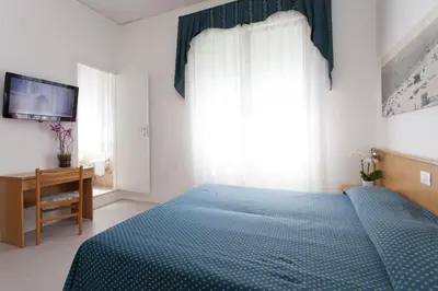Letto o letti in una camera di Hotel Marina