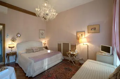 Letto o letti in una camera di Ca' della Corte