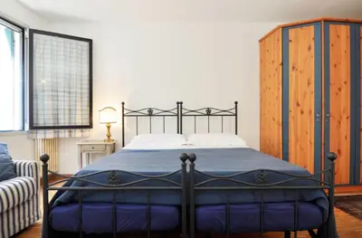 Letto o letti in una camera di San Rocco Apartment