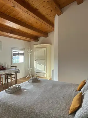 Letto o letti in una camera di BeeHouse - La Casa delle Api Agriturismo