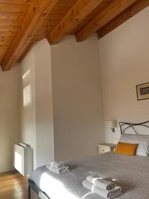 Letto o letti in una camera di BeeHouse - La Casa delle Api Agriturismo
