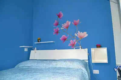 Letto o letti in una camera di Piccola Suite Blu