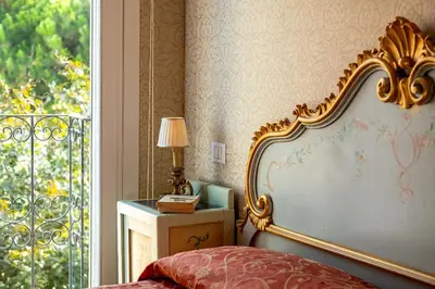 Letto o letti in una camera di Hotel Rigel