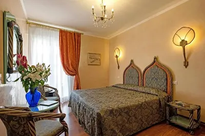 Letto o letti in una camera di Hotel Rigel