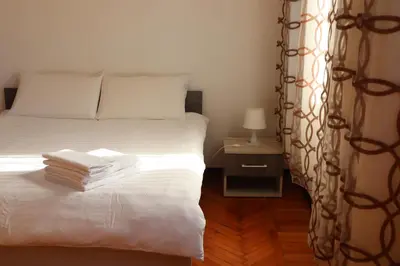 Letto o letti in una camera di b&b Wu Giada