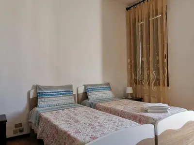 Letto o letti in una camera di b&b Wu Giada